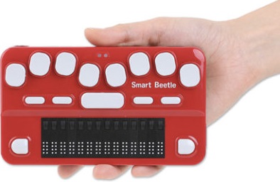 Smart Beetle shown in user's hand to demonstrate small size